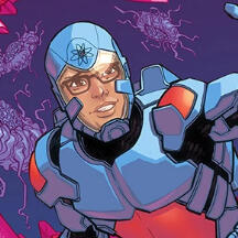 A picture of Ryan Choi as The Atom. He is wearing his armored blue and red Atom suit. His helmet has a yellow visor that covers his entire face. He is looking towards the right and smiling. He is wearing glasses. The background behind him is purple.