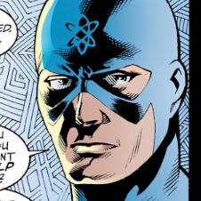 A picture of Ray Palmer as The Atom. He is in his blue uniform with the Atom symbol drawn on his cowl's forehead. The picture is a closeup of his face as he looks towards the right. The background behind him is a geometrical pattern of inked lines.